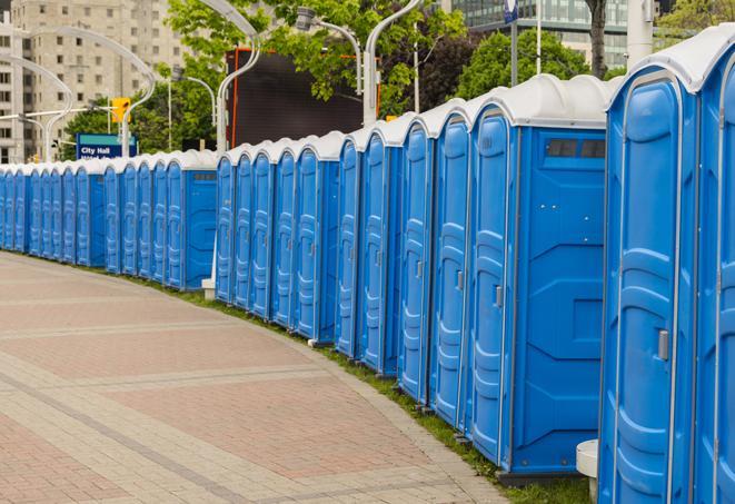 hygienic portable restrooms lined up at a beach party, ensuring guests have access to the necessary facilities while enjoying the sun and sand in Boynton Beach, FL